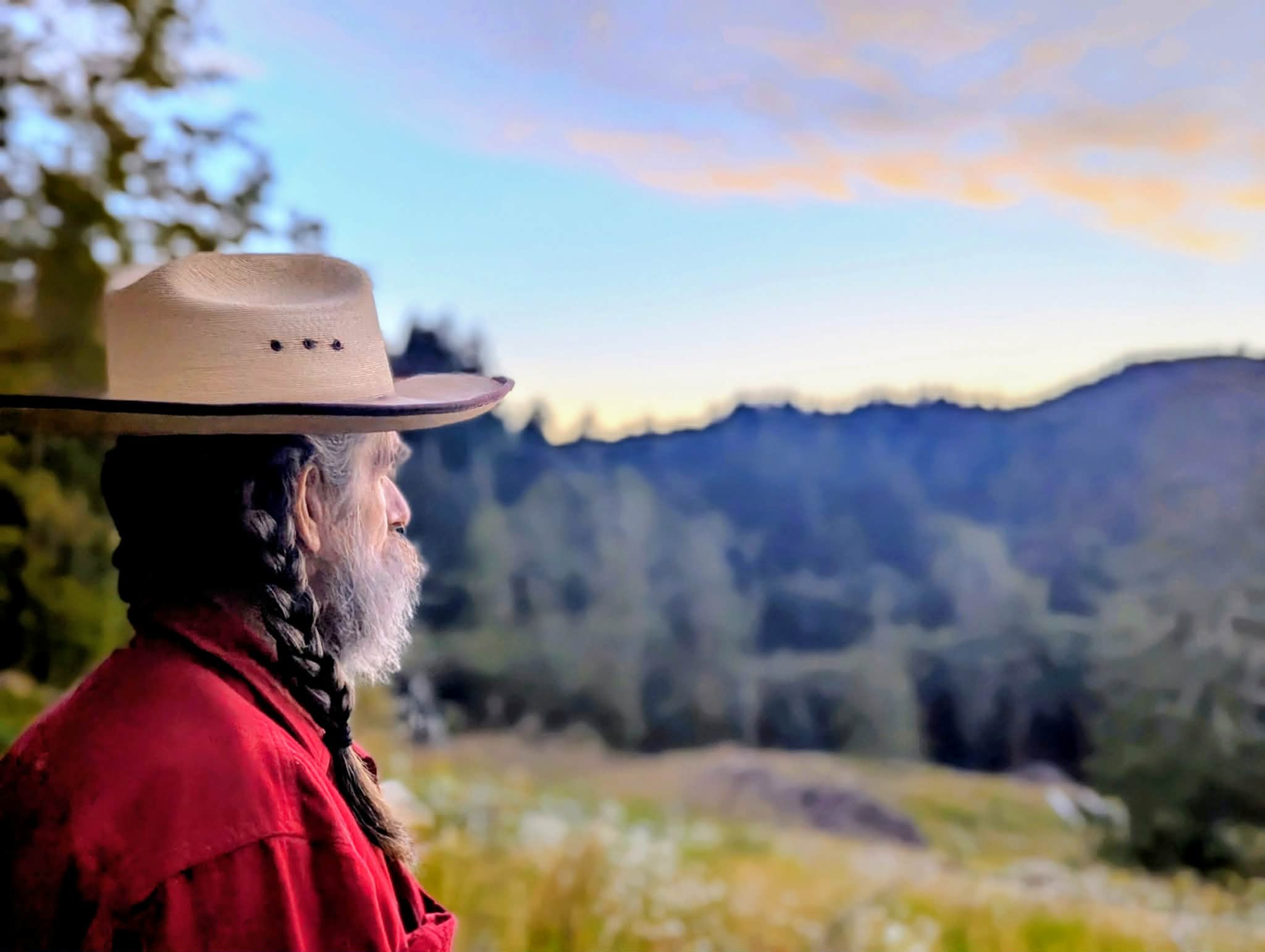 The owner of Foxfur Ink overlooking the mountains of northwestern Oregon