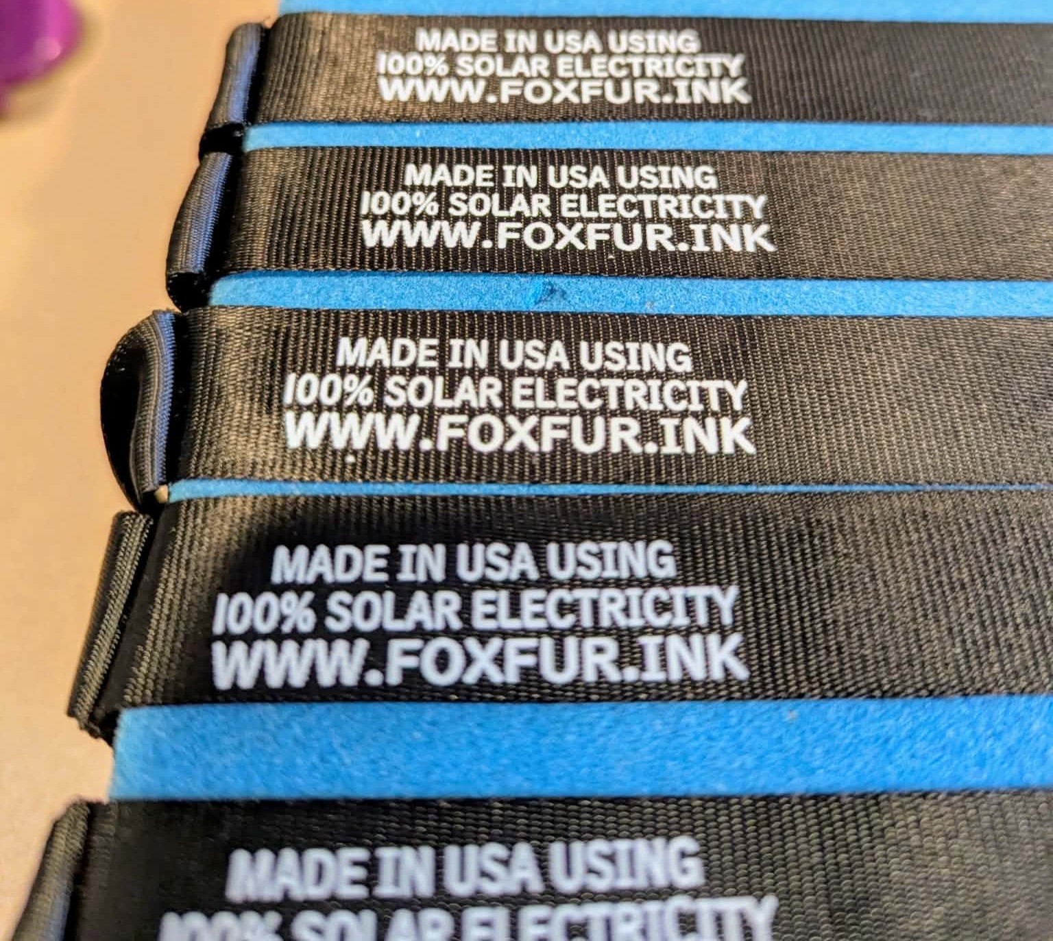 Foxfur Ink product labels reading Made in USA Using 100% Solar Electricity